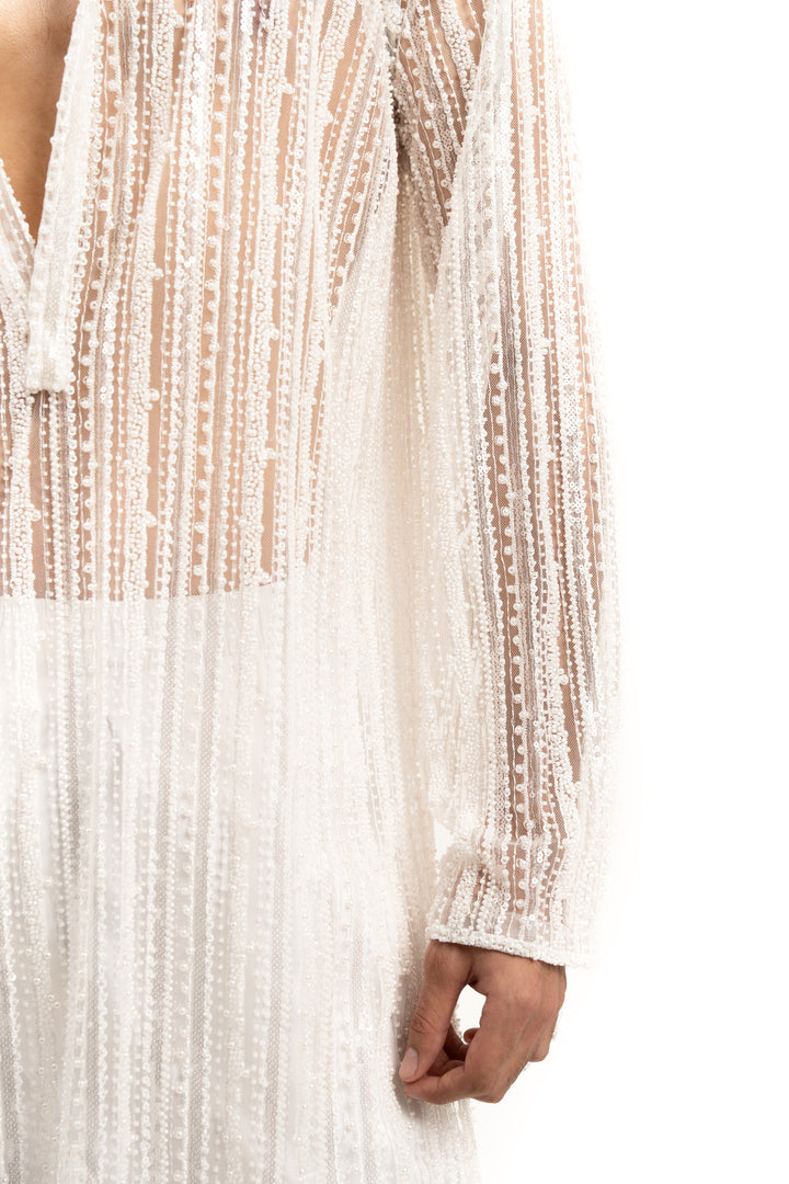 white heavily embellished kurta